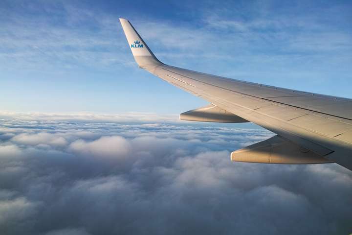 Airplane above the clouds